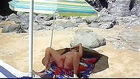 French mature masturbates at the beach