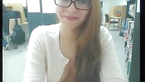 Hot cutie masturbating in the library 1