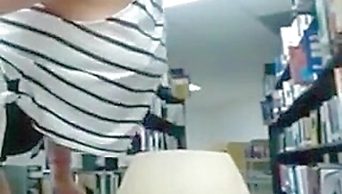 Hot beauty masturbating in the library 4